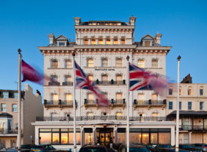 Front exterior shot of Mercure Brighton Seafront Hotel at dusk