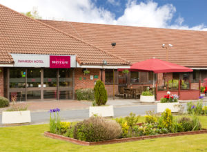 The red brick front of Mercure Swansea Hotel