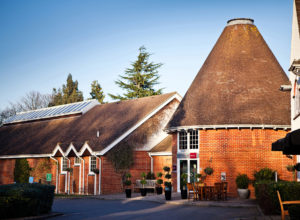 The red brick front of Mercure Tunbridge Wells Hotel on a sunny day