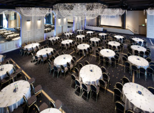 Tables set for a conference in The International Suite at Mercure Manchester Piccadilly Hotel set for a conference